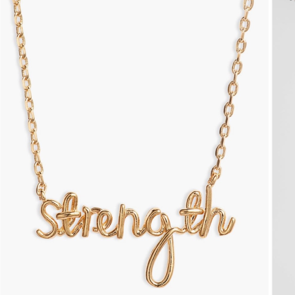 NWT Estella Bartlett βStrengthβ Goldtone Pendant Necklace